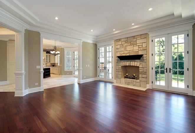 gleaming hardwood floors in a spacious open-concept kitchen